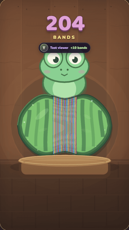 Streamshot's live watermelon mini-game overlay with a frog, a horizontally band-wrapped watermelon, and the current band count.